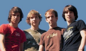 Still image of the band.