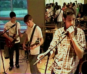 Still image of the band.